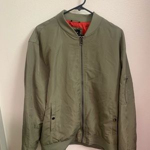 A green jacket, rain resistant